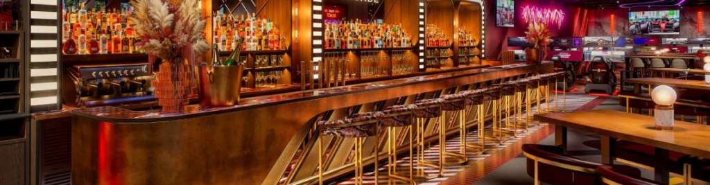 Si te gusta la Fórmula 1 estás de enhorabuena: llega el primer Arcade bar a España, un lugar único